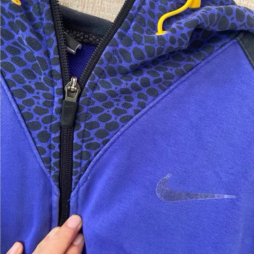 Nike Kids Royal Blue Hoodie with Black Pattern and Yellow Drawcords